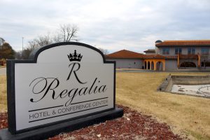 The Regalia Hotel & Conference Center sign