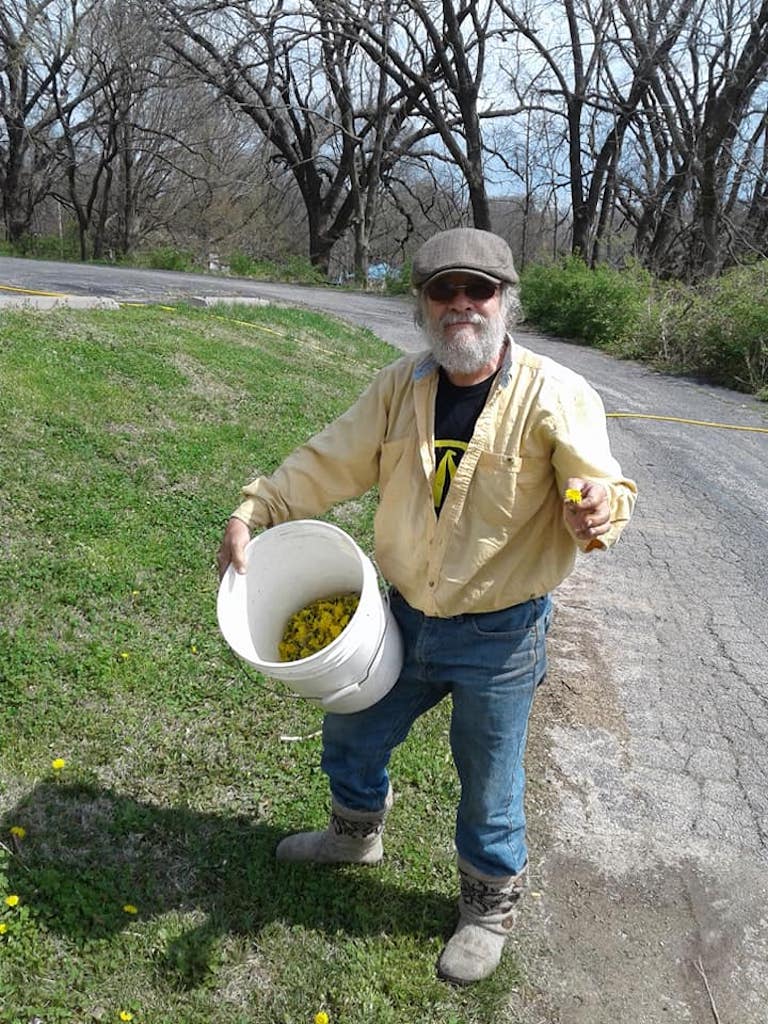 Man holding produce from the garden