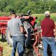 An image of Missouri farmers learning at the Missouri Organic Association's August workshop and field day