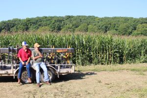 An image of Missouri farmers learning at the Missouri Organic Association's August workshop and field day