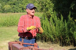 An image of Missouri farmers learning at the Missouri Organic Association's August workshop and field day