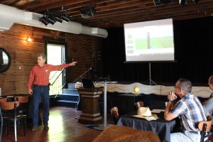 An image of Missouri farmers learning at the Missouri Organic Association's August workshop and field day