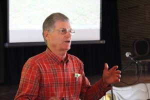 An image of Missouri farmers learning at the Missouri Organic Association's August workshop and field day